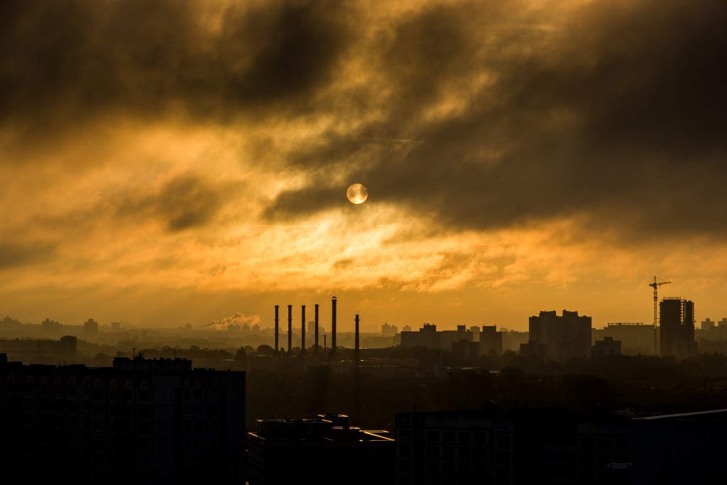 image of a troubled environment with a city in the background