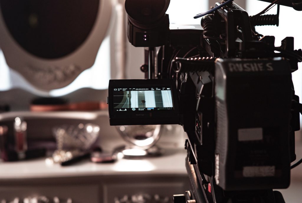 decorative image: behind the camera