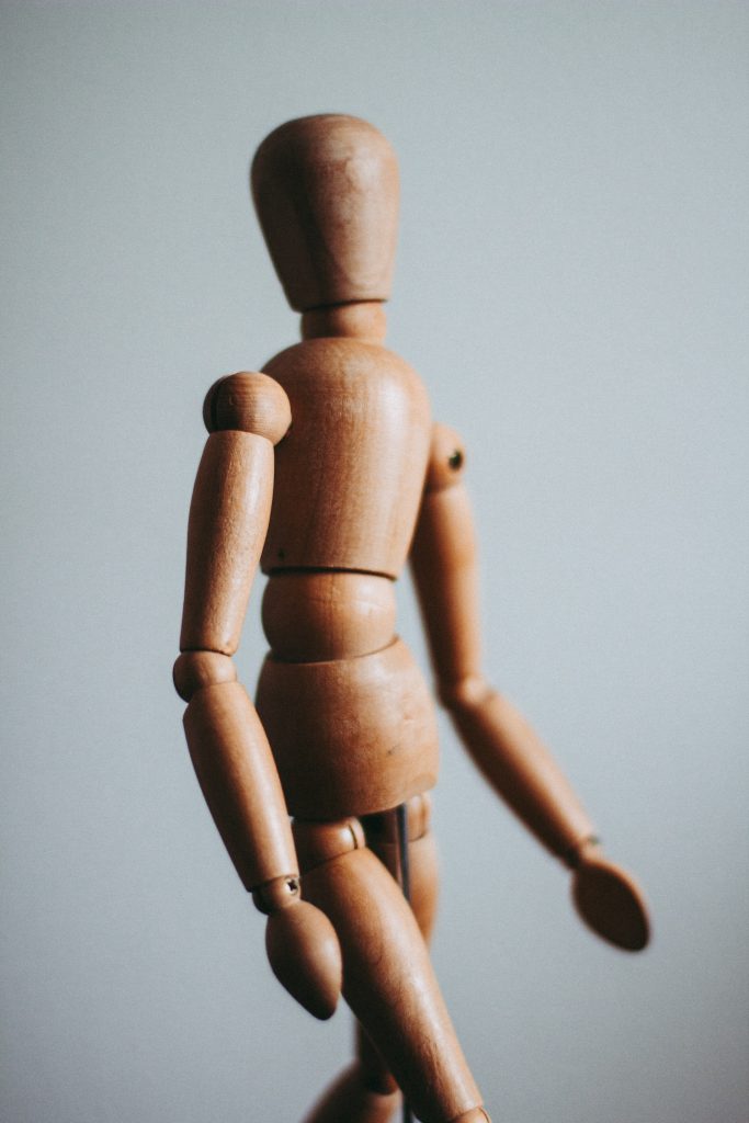 decorative image: wooden doll