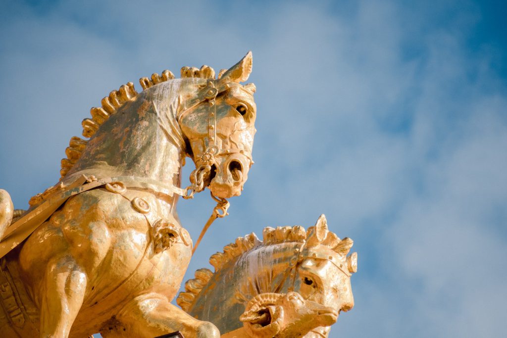 decorative image: golden horses