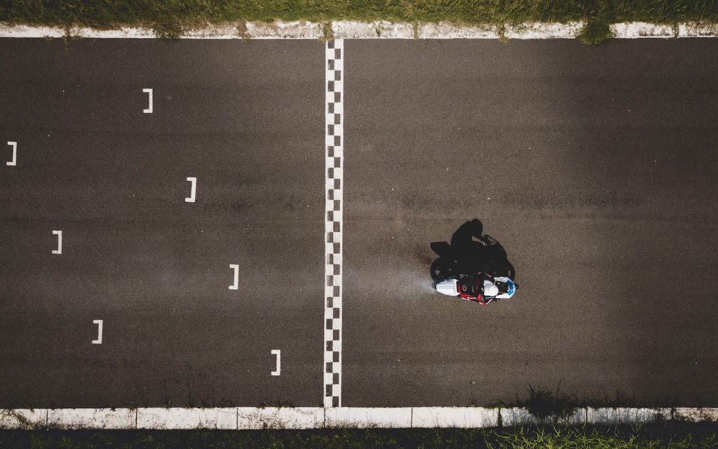 motorcycle about to cross the finish line