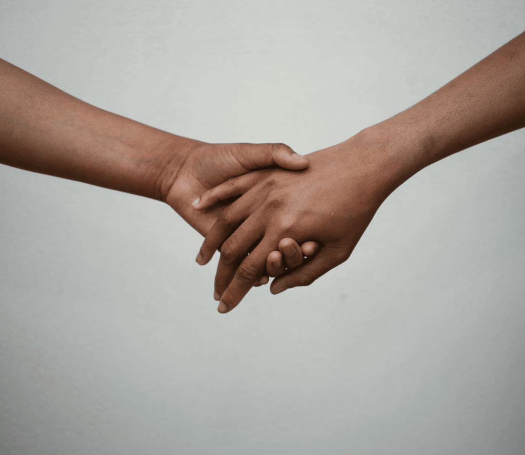 two hands holding